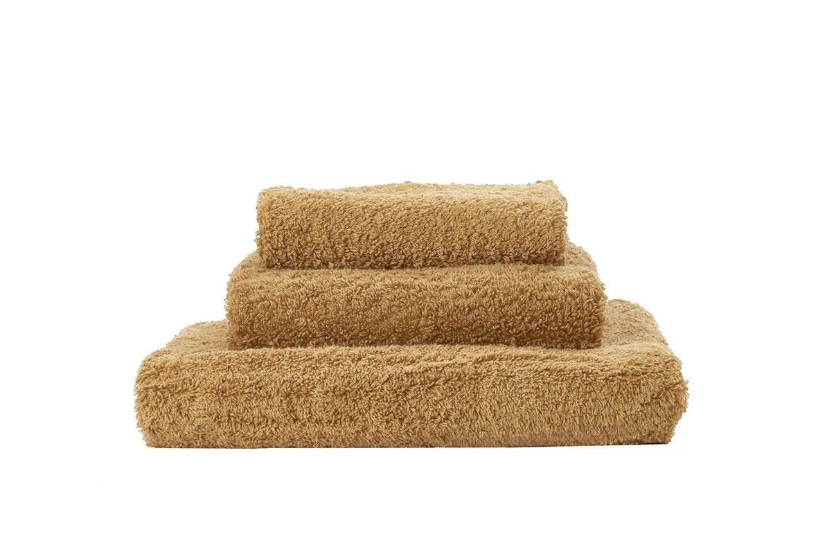 Super Pile Gold Towels by Abyss and Habidecor